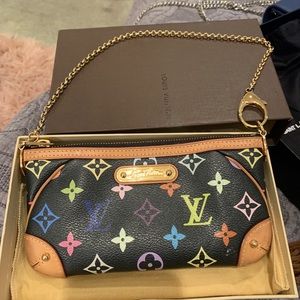 Authentic Louis Vuitton Milla clutch